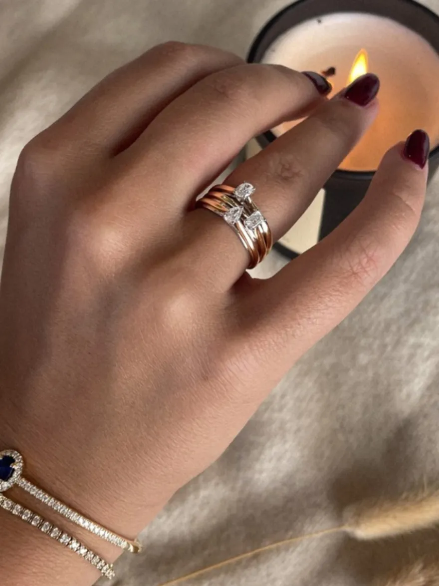 Gouden bicolor ring met peer diamant 0,23crt. + Luxe Cadeau