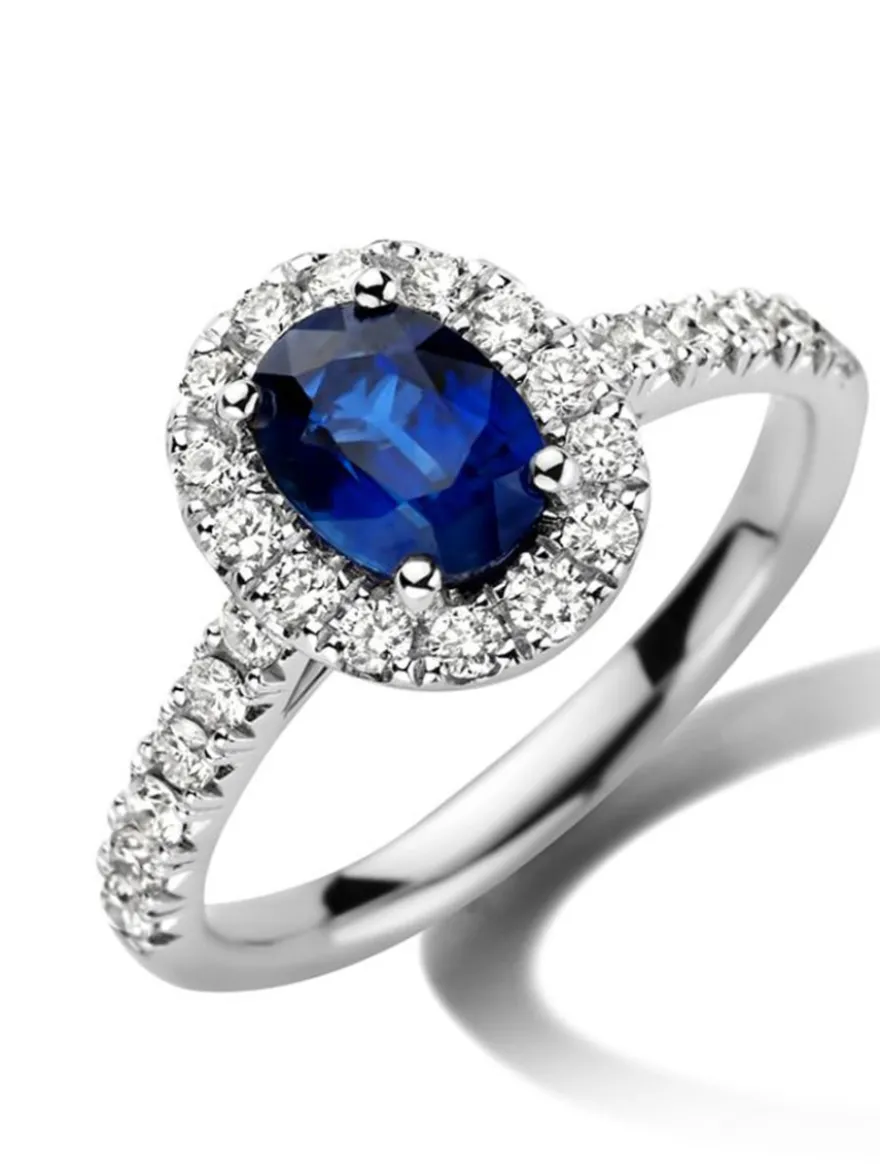 Witgouden entourage ring met saffier en briljant 0,49crt.